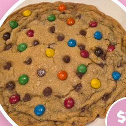 A giant cookie loaded with M and Ms